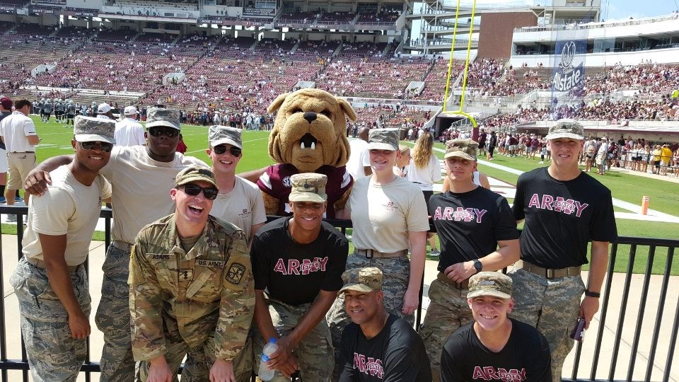 Army and Air Force cadets pose with Bully