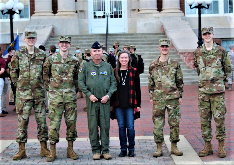 Col Henderson and wife with two cadets on each side